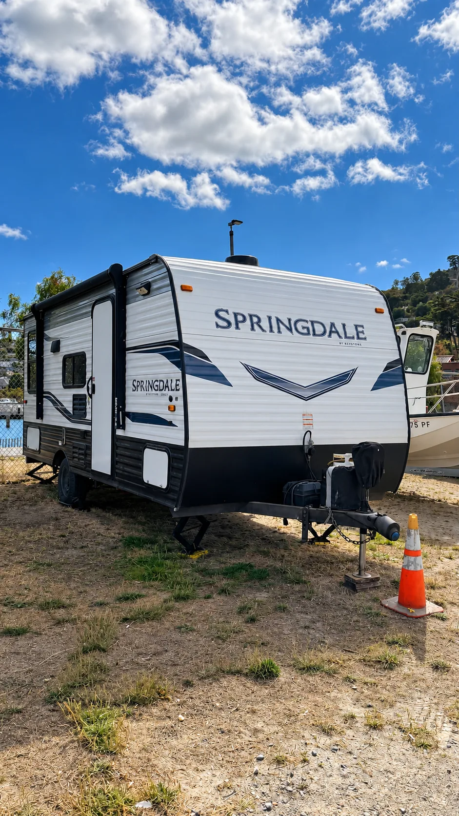 Travel trailer parked in vehicle and trailer storage at Marinship Industries Storage, Sausalito